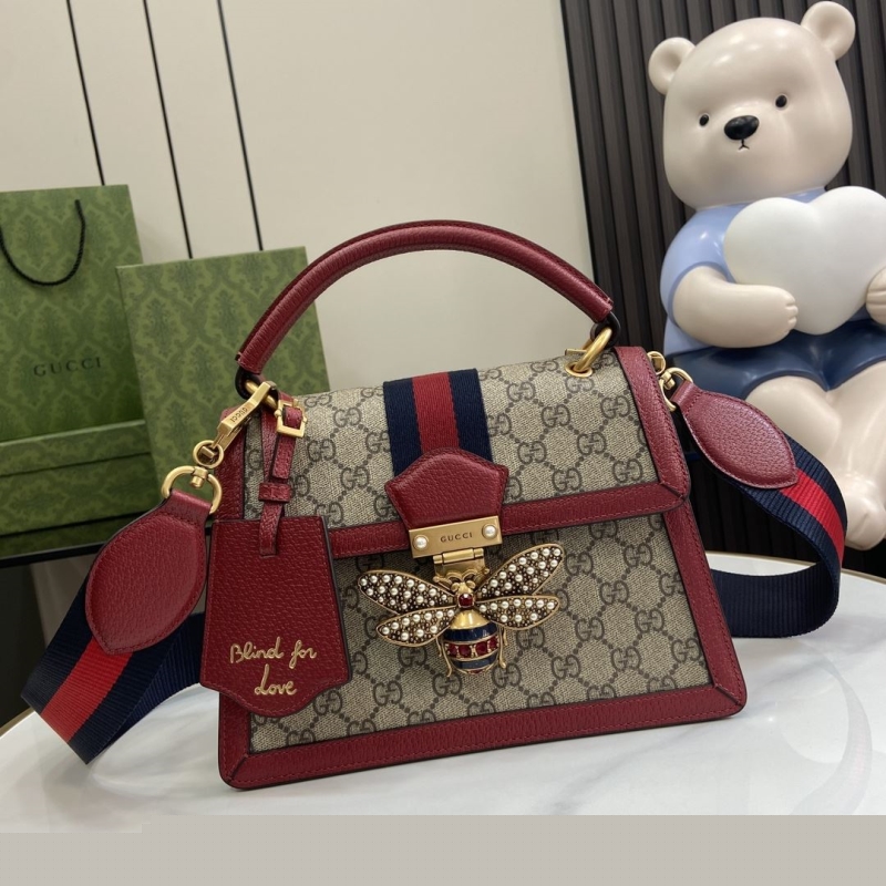 G*u*i top handle bags